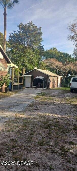 view of home's exterior featuring a carport