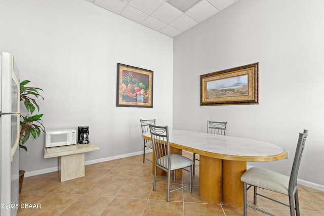 tiled dining space with breakfast area