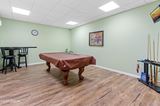 playroom featuring a paneled ceiling, billiards, and light wood-type flooring