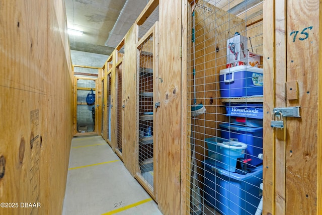 corridor featuring tile walls