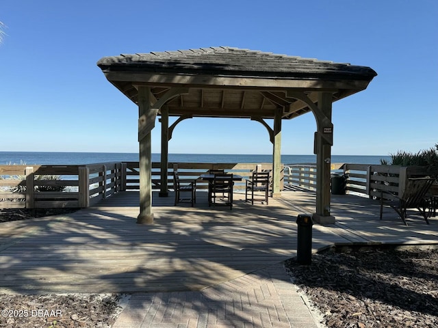 view of property's community featuring a gazebo and a water view