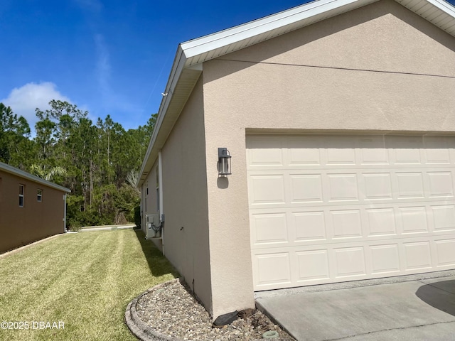 garage with a yard