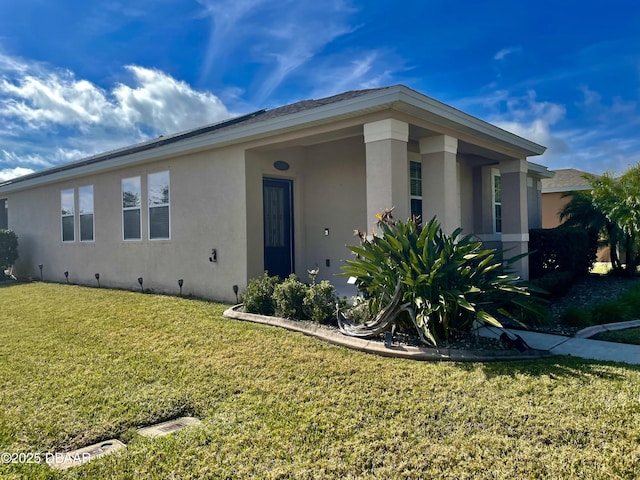 view of front of property with a front lawn