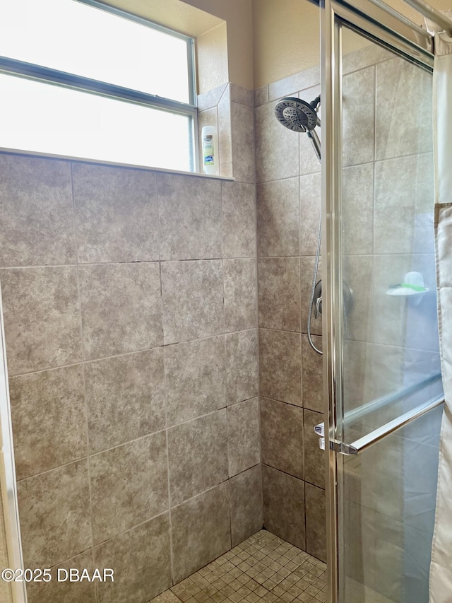 bathroom featuring an enclosed shower