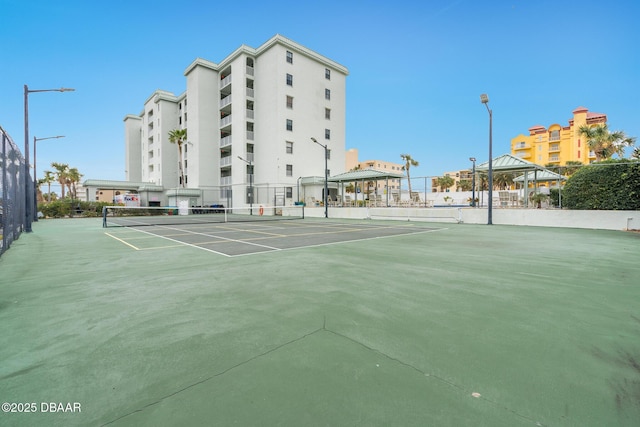 view of sport court with a gazebo