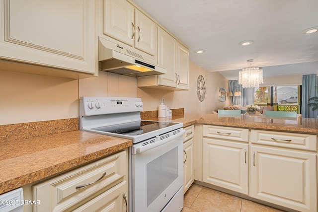 kitchen with kitchen peninsula, cream cabinetry, light tile patterned flooring, a notable chandelier, and white electric range