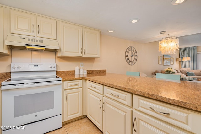 kitchen with light tile patterned floors, cream cabinetry, white electric stove, kitchen peninsula, and pendant lighting