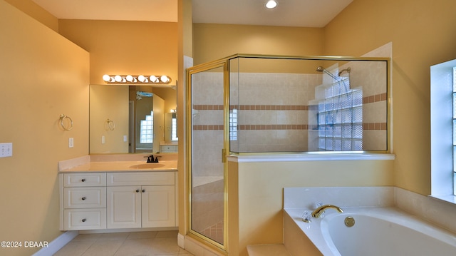 bathroom with vanity, tile patterned flooring, and separate shower and tub