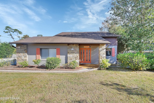 view of front of home with a front yard