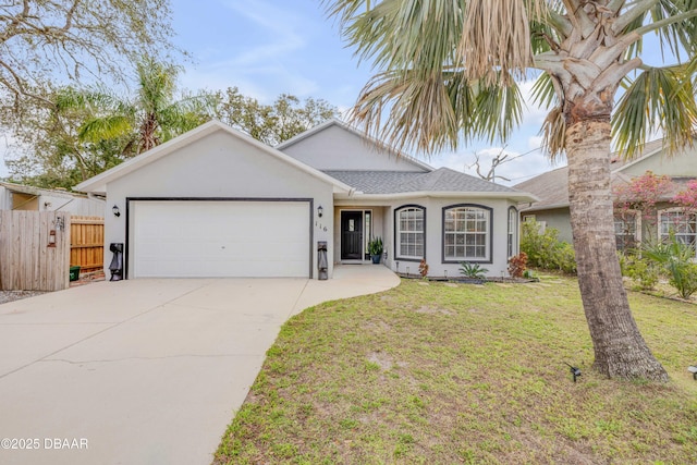 single story home featuring a garage, concrete driveway, a front yard, and stucco siding