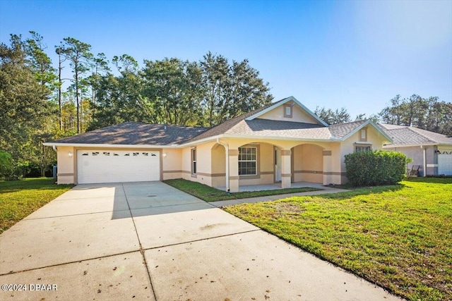 ranch-style home with a front lawn and a garage