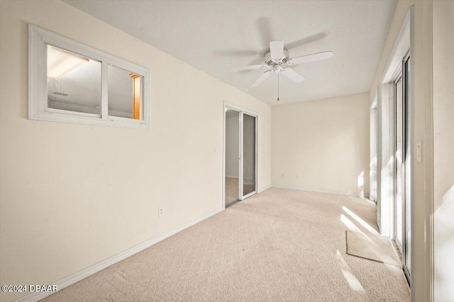 interior space featuring ceiling fan