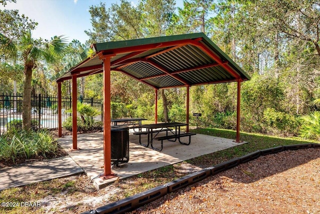 view of property's community with a patio and a gazebo