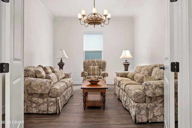 living room featuring a chandelier, dark hardwood / wood-style floors, and crown molding