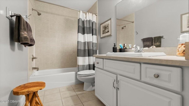 full bathroom featuring tile patterned flooring, vanity, shower / tub combo, and toilet