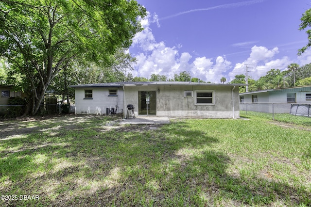 607 Marlene Dr, Holly Hill, FL 32117 - back of house featuring a patio
