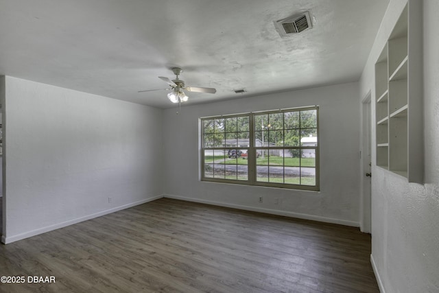 607 Marlene Dr, Holly Hill, FL 32117 - empty room featuring a ceiling fan and wood finished floors