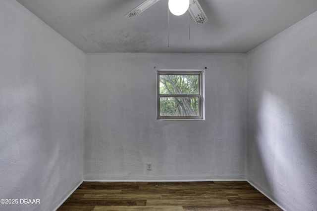 607 Marlene Dr, Holly Hill, FL 32117 - spare room with dark wood-style floors and a ceiling fan