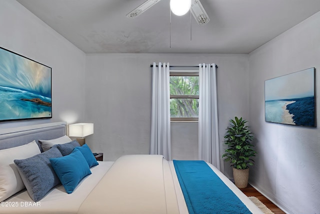 607 Marlene Dr, Holly Hill, FL 32117 - bedroom with wood finished floors and a ceiling fan