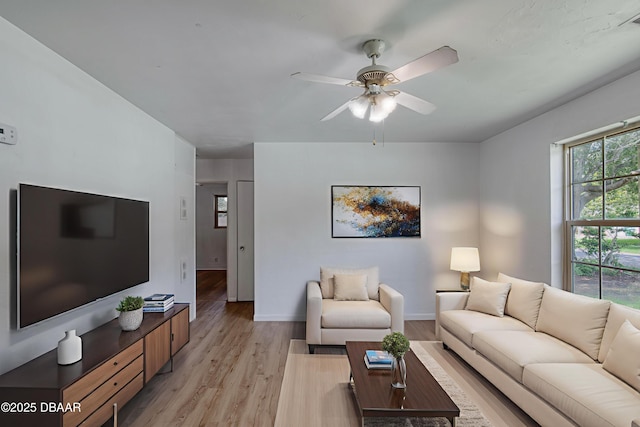 607 Marlene Dr, Holly Hill, FL 32117 - living area with light wood-style flooring and a ceiling fan