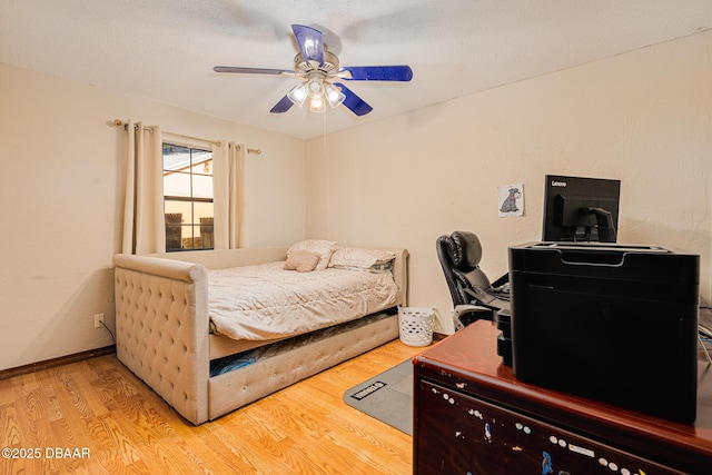 894 Quarters Ct, Port Orange, FL 32129 - bedroom featuring wood finished floors, a desk, and a ceiling fan