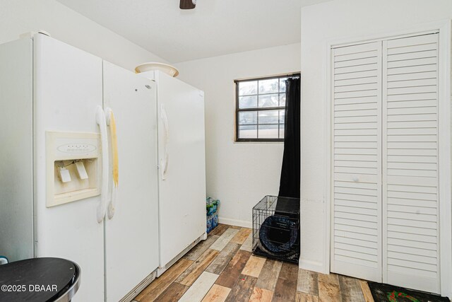 894 Quarters Ct, Port Orange, FL 32129 - laundry area with wood finished floors