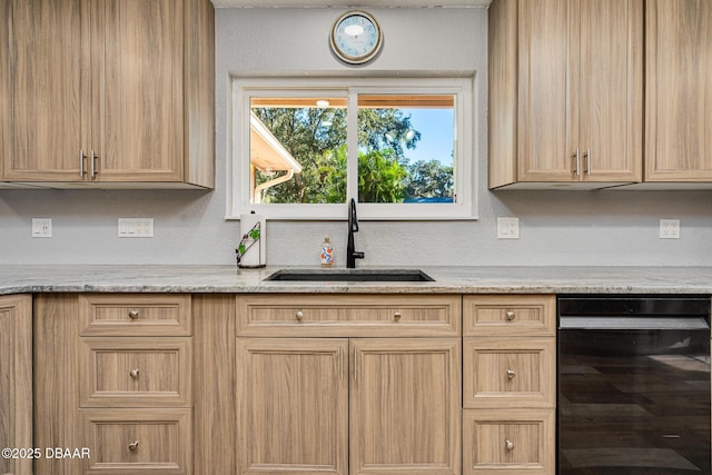 894 Quarters Ct, Port Orange, FL 32129 - kitchen with wine cooler, light stone countertops, and light brown cabinetry