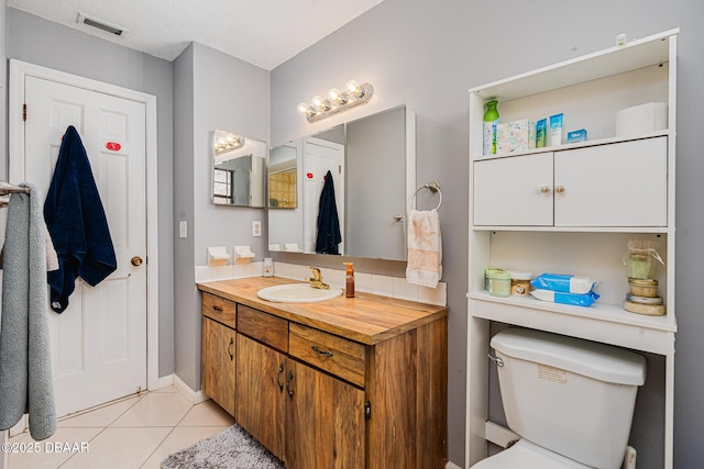 894 Quarters Ct, Port Orange, FL 32129 - bathroom featuring vanity and tile patterned flooring