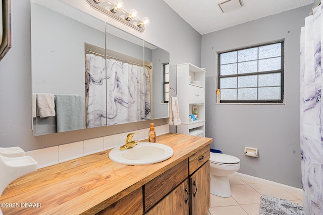 894 Quarters Ct, Port Orange, FL 32129 - full bath featuring tile patterned flooring, vanity, and a shower with curtain