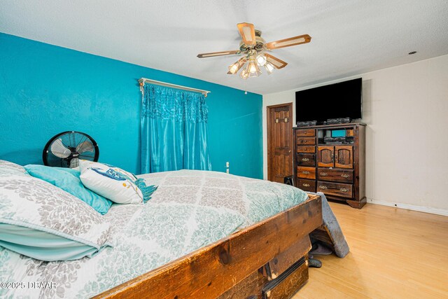 894 Quarters Ct, Port Orange, FL 32129 - bedroom featuring wood finished floors and ceiling fan
