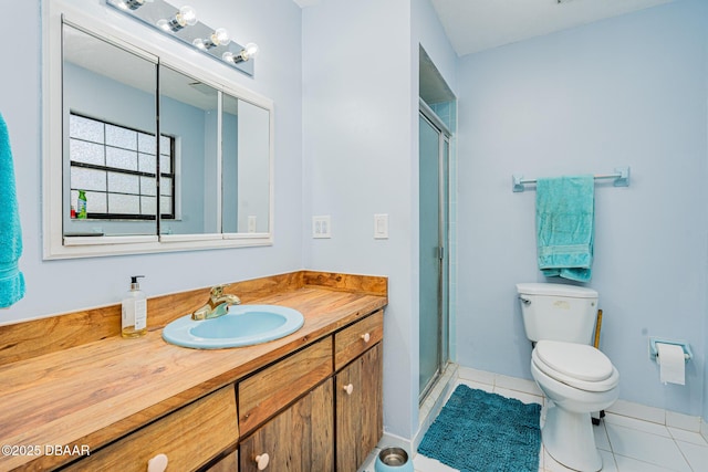 894 Quarters Ct, Port Orange, FL 32129 - full bath featuring vanity, tile patterned flooring, and a stall shower
