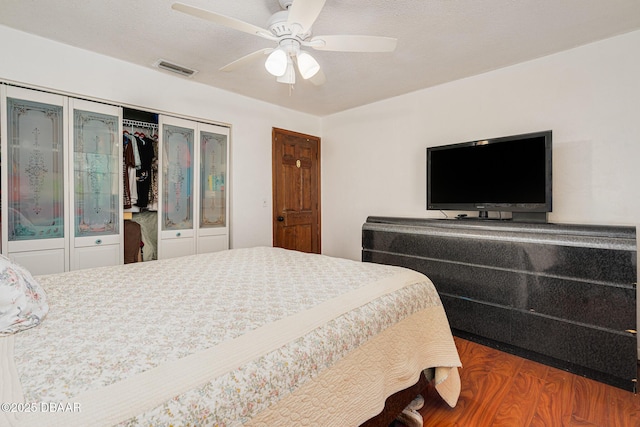 894 Quarters Ct, Port Orange, FL 32129 - bedroom featuring wood finished floors, a closet, and a ceiling fan