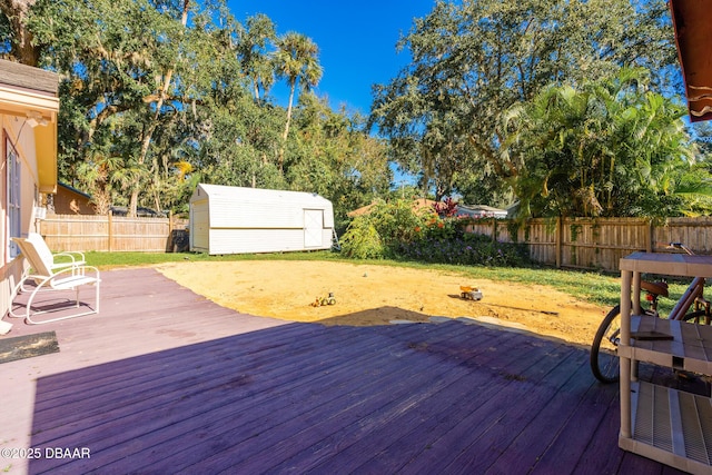 894 Quarters Ct, Port Orange, FL 32129 - deck featuring a fenced backyard and a storage shed