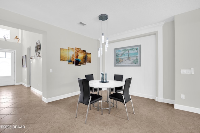 281 Compass Rose Dr, Daytona Beach, FL 32124 - tiled dining room with baseboards