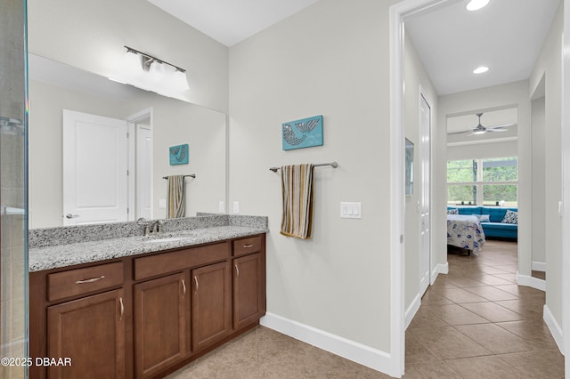 281 Compass Rose Dr, Daytona Beach, FL 32124 - ensuite bathroom featuring tile patterned floors, baseboards, a ceiling fan, vanity, and recessed lighting