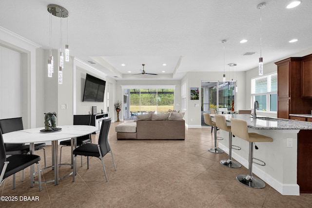281 Compass Rose Dr, Daytona Beach, FL 32124 - dining room featuring a ceiling fan, recessed lighting, baseboards, and light tile patterned flooring