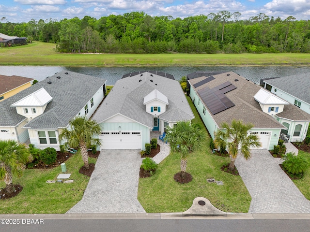 281 Compass Rose Dr, Daytona Beach, FL 32124 - view of subject property with a nearby body of water and a heavily wooded area