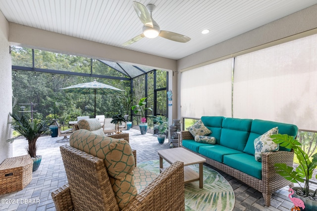 sunroom / solarium with ceiling fan