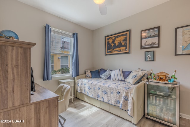 bedroom featuring ceiling fan and light hardwood / wood-style flooring