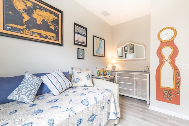 bedroom featuring wood-type flooring