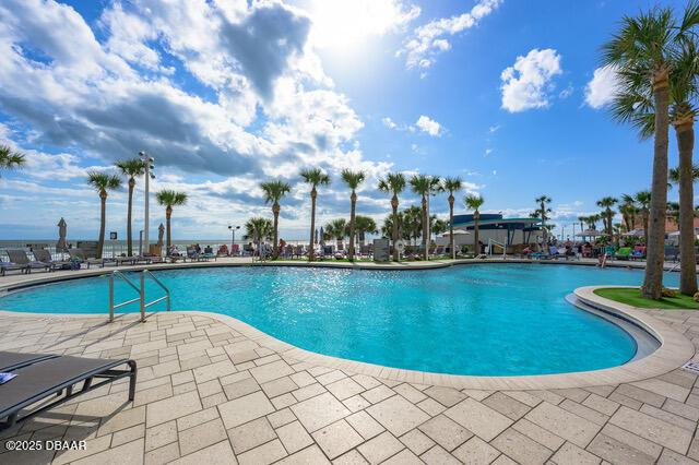 pool featuring a patio area