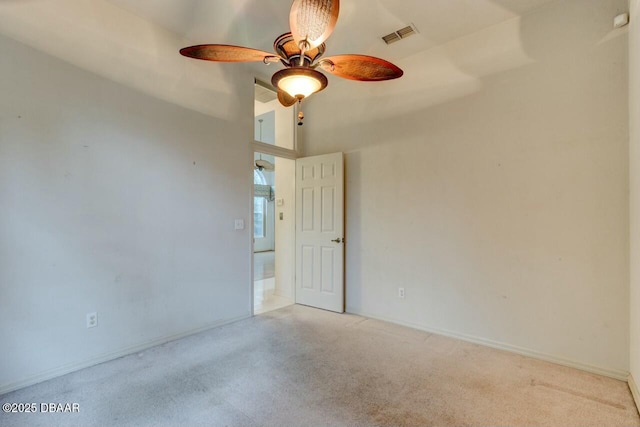 unfurnished room featuring ceiling fan, light colored carpet, and high vaulted ceiling