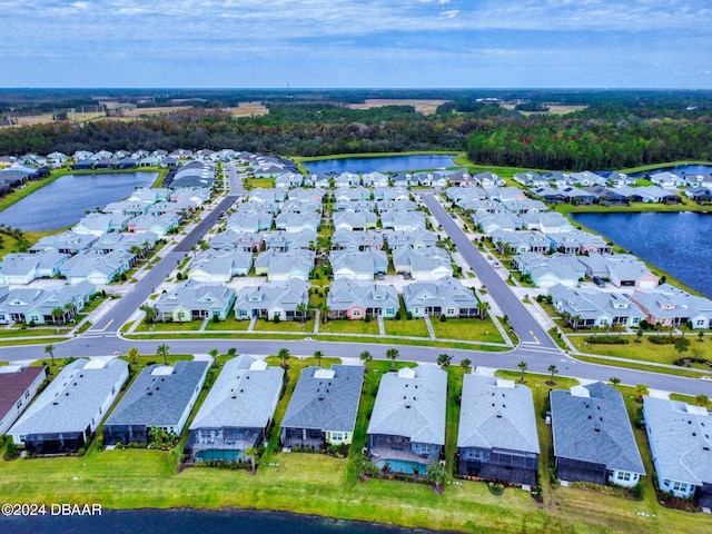 aerial view with a water view and a residential view