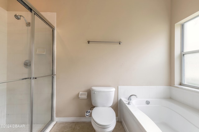 bathroom with toilet, shower with separate bathtub, and tile patterned floors