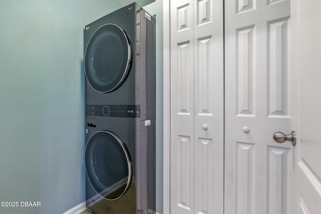 3328 Marsili Ave, New Smyrna Beach, FL 32168 - washroom with stacked washer / dryer and laundry area