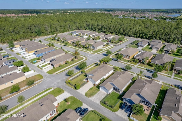 3328 Marsili Ave, New Smyrna Beach, FL 32168 - birds eye view of property featuring a wooded view and a residential view