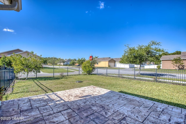 3328 Marsili Ave, New Smyrna Beach, FL 32168 - view of patio / terrace with a fenced backyard and a residential view