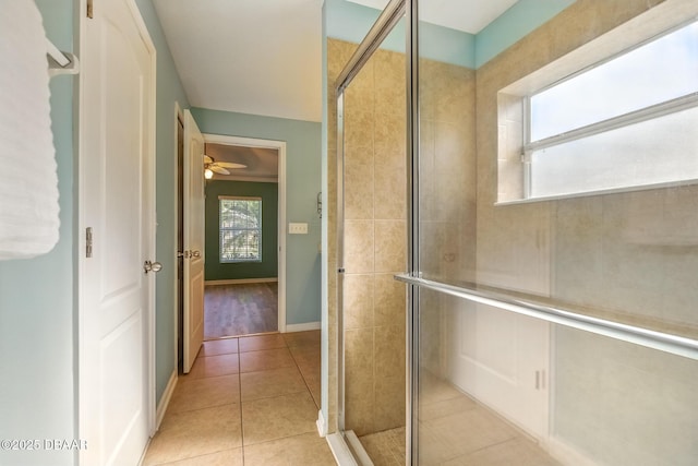 3328 Marsili Ave, New Smyrna Beach, FL 32168 - interior space with a shower stall, ceiling fan, baseboards, and tile patterned floors