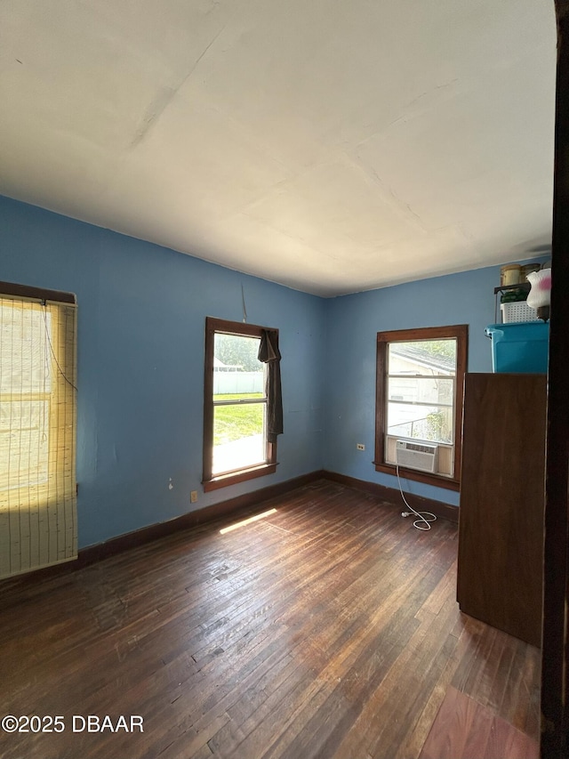 208 Bellevue Ave, Daytona Beach, FL 32114 - empty room with plenty of natural light and wood-type flooring