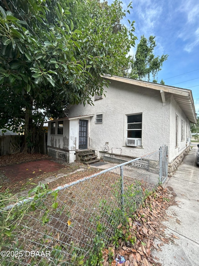 208 Bellevue Ave, Daytona Beach, FL 32114 - view of property exterior with stucco siding